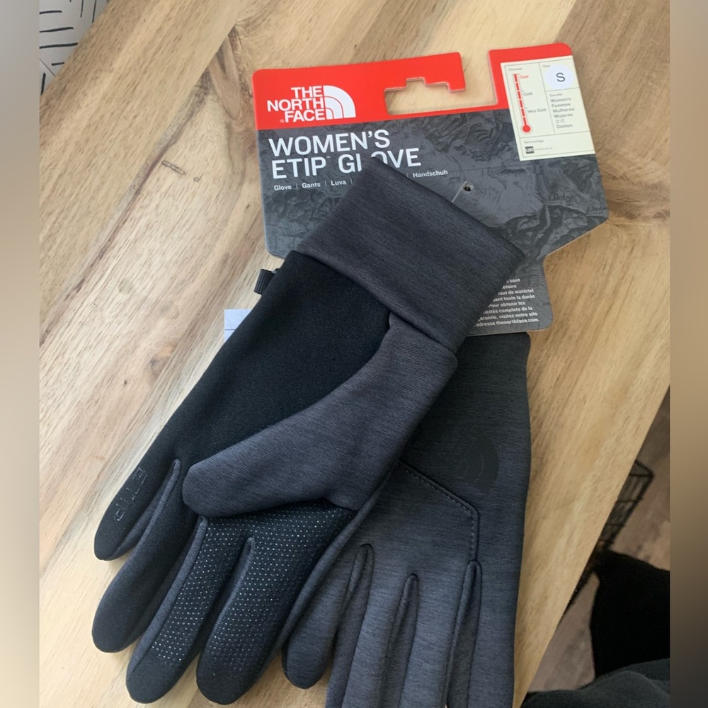 The North Face womens etip gloves. Brand new. Size small.